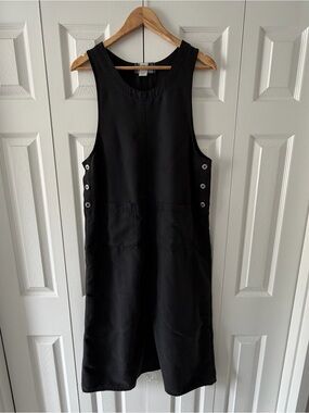 Directive Sleeveless Black Button-Side Overall Dress with Pockets